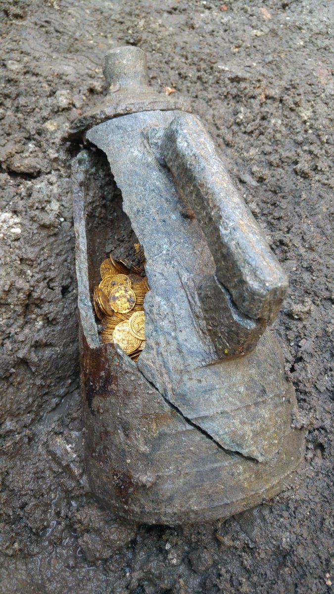 A soap box filled with ancient gold coins for sale at the site of Como, Italy, is 3,500 years old. - News