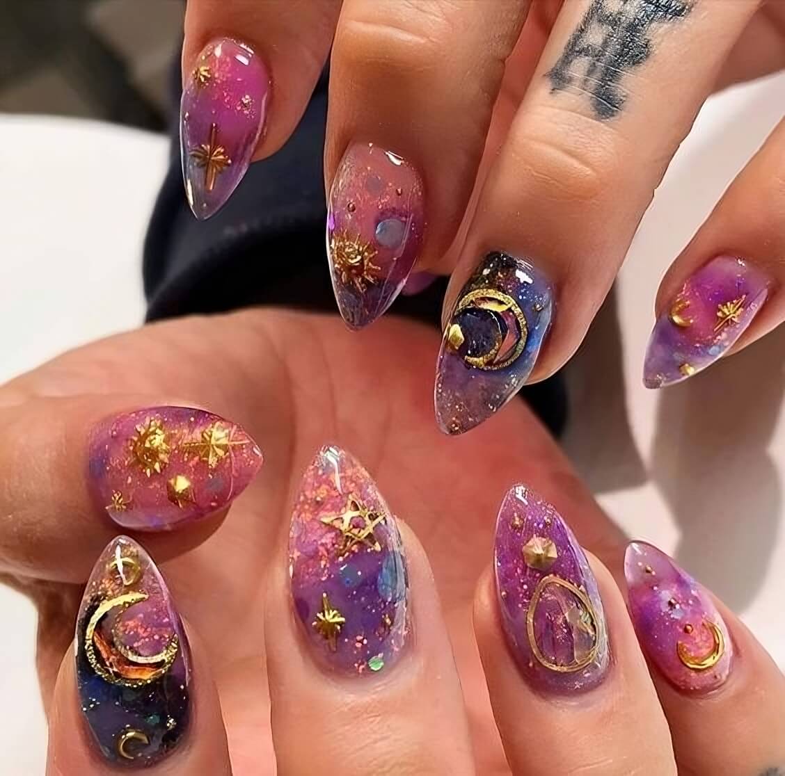 Take your manicure to the next level with these 30 stunning galactic nail art ideas.