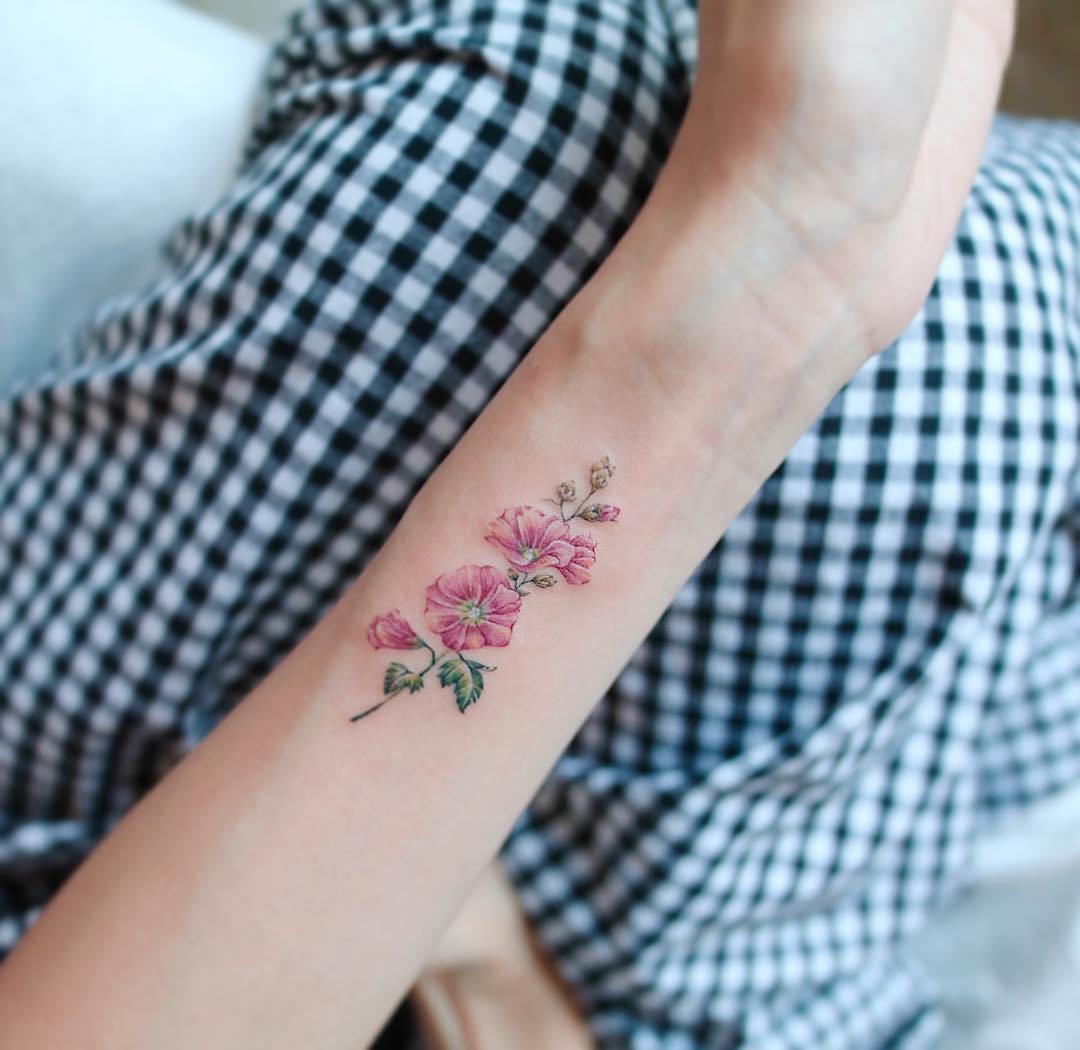 Hollyhock tattoo by tattooist Nemo - Tattoogrid.net