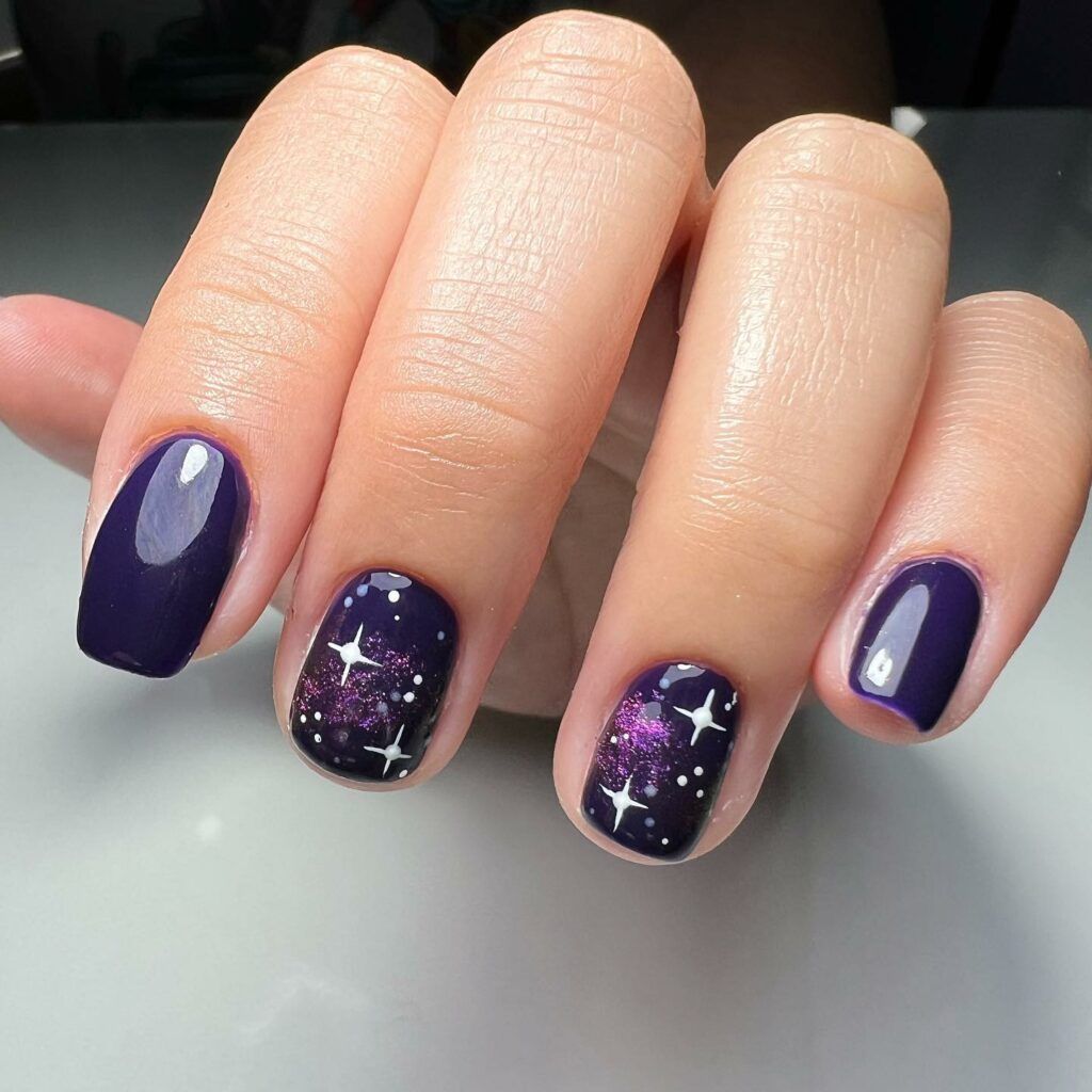 Galaxy Nails: 44+ Out Of This World Designs You Will Fall In Love With |  Dark purple nails, Purple nail art, Star nail designs