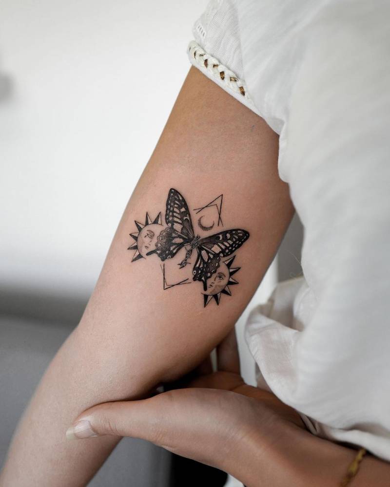 Butterfly tattoo on the inner arm