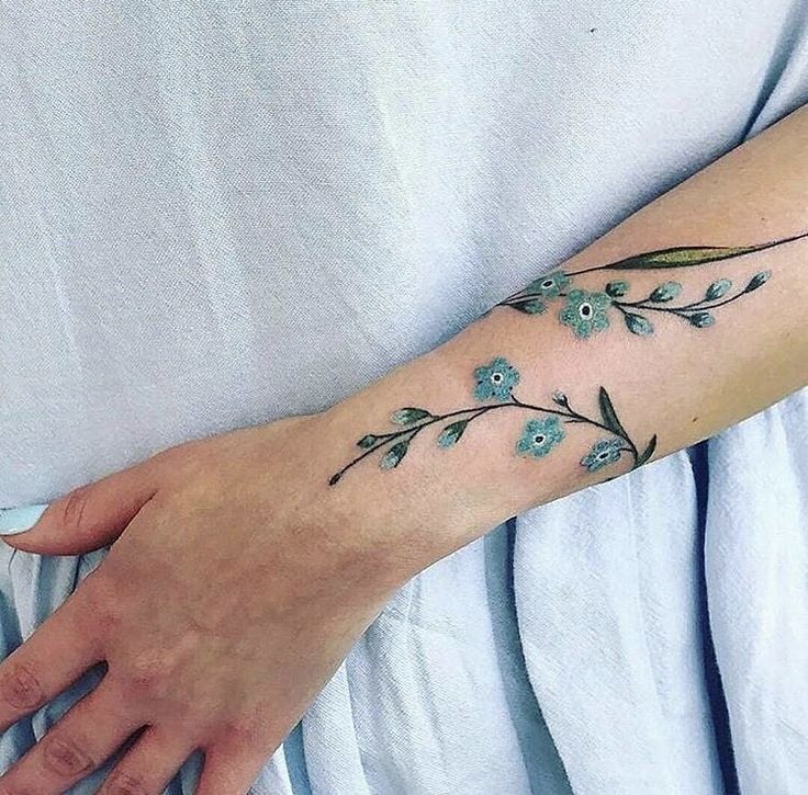 Shared by Sofia. Find images and videos about blue, flowers and tattoo on  We Heart It - t… | Wrap around wrist tattoos, Wrist tattoos for women,  Small wrist tattoos