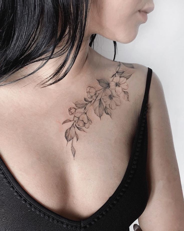 Elegant Floral Collarbone Tattoo